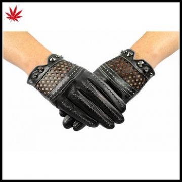 Ladies black short leather gloves driving unlined with studs and punch