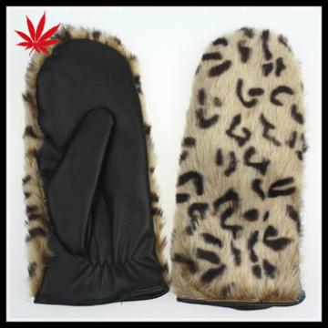 Women&#39;s mitten leather gloves with fake fur