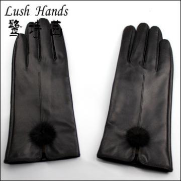 lady&#39;s black genuine leather gloves with black rabbit fur ball