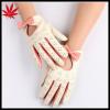 Girl&#39;s cream short driving leather gloves with butterfly