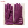 Women&#39;s 100% woolen gloves with according color buttons