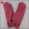 Pink wool gloves with handmade butterfly