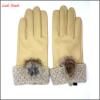 2016 new design yellow leather driving gloves with a fuzzy ball