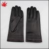 Black leather gloves with many special design stichings at the bottom