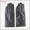 Women&#39;s leather gloves with sewings design at bottom