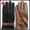 Brown leather gloves with cloth fabric on the back for men