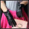 women fashion black patent leather glove with bow