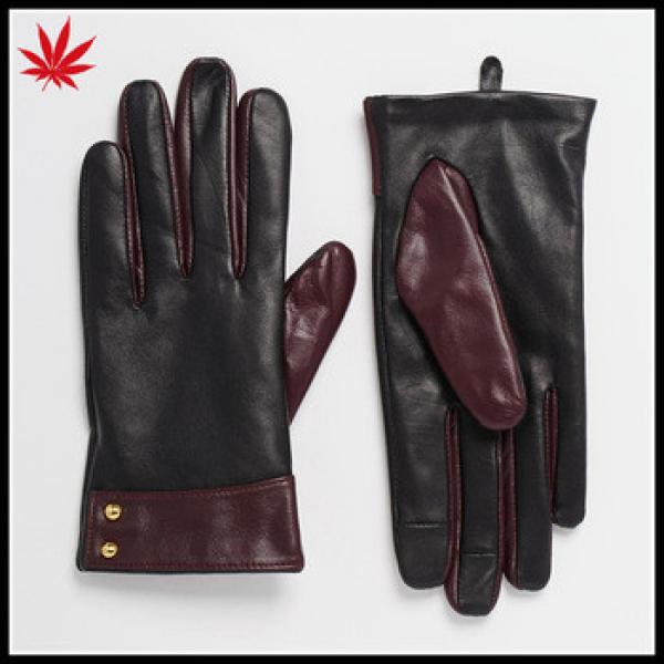Ladies smart phone wearing leather gloves with cuff detail #1 image