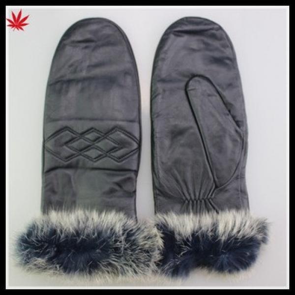 rabbit fur cuff women wearing warm winter mittens leather gloves #1 image
