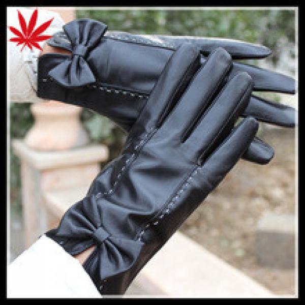 ladies leather gloves with bow cuff #1 image