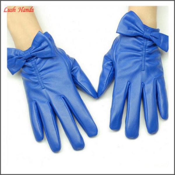 ladies navy leather gloves with bow cuff details #1 image