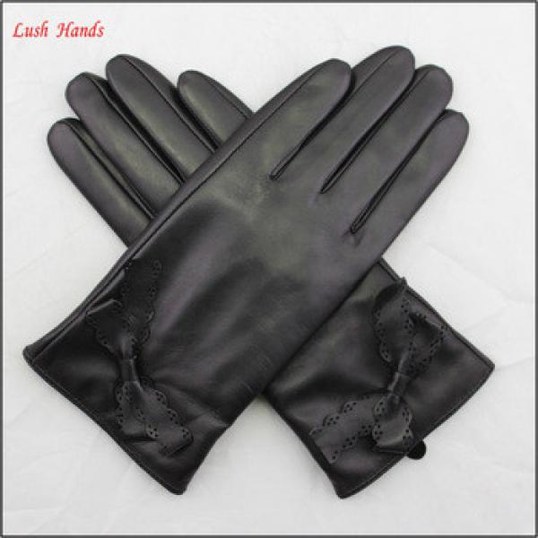 The best quality ladies and girls leather gloves with leather bow #1 image