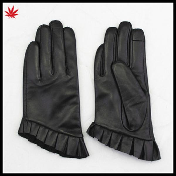 short fingerled style fashion women dressed black leather gloves #1 image