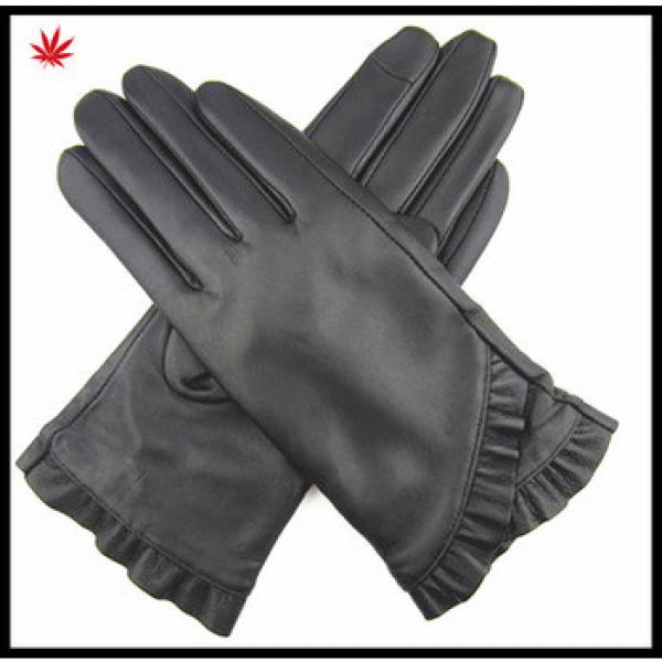 lady black leather gloves with samll swallow tail side #1 image